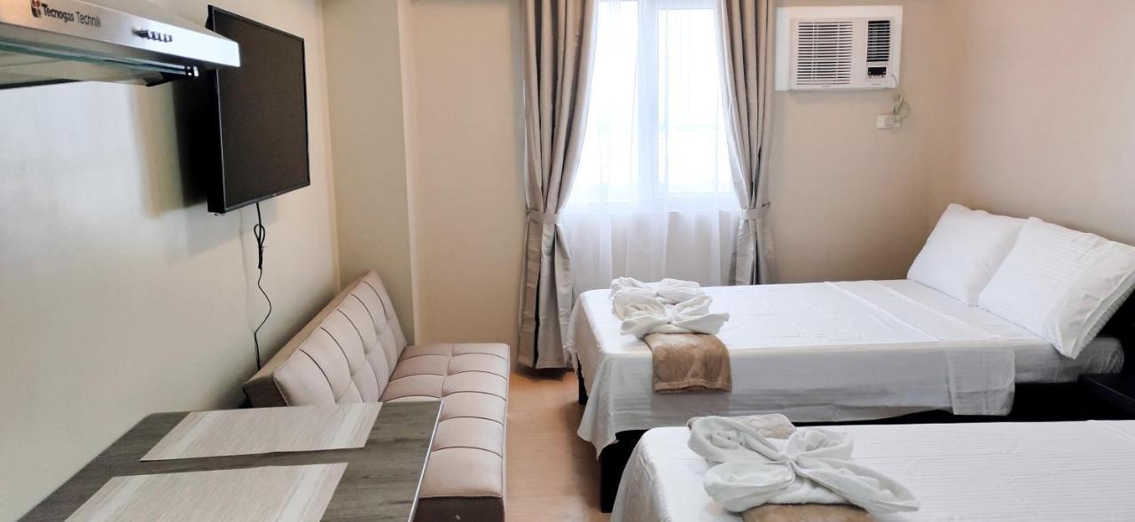 Sunvida Tower Stays Across Sm City Cebu Екстер'єр фото